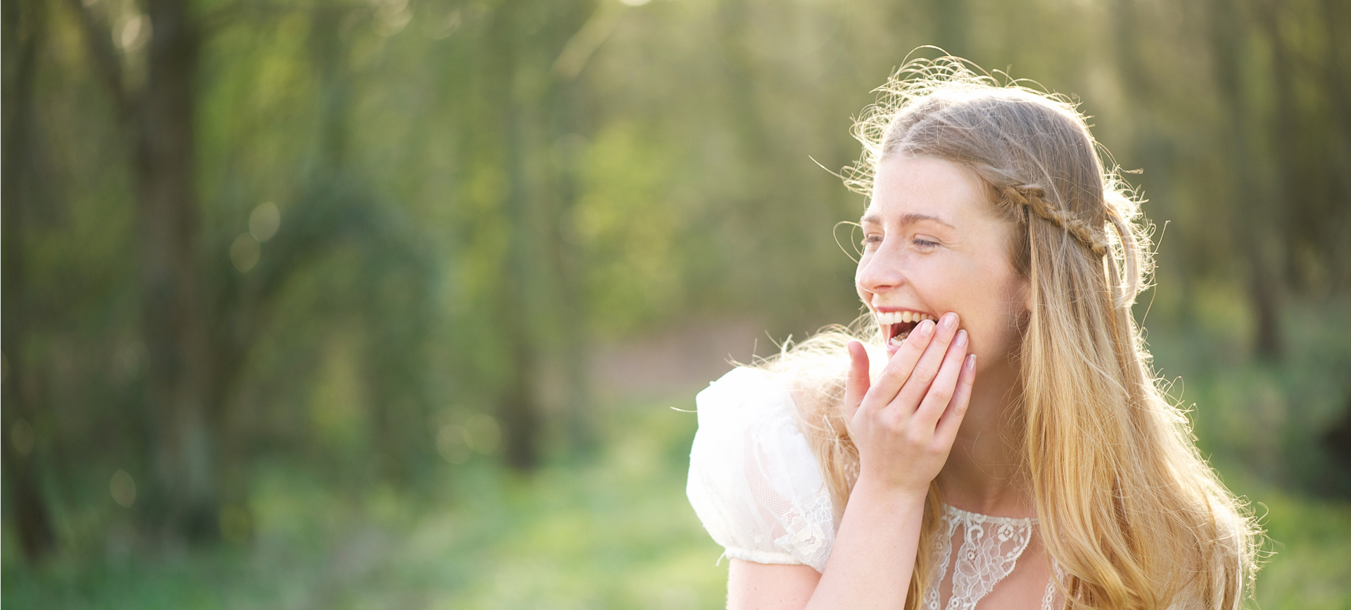 Woman smiling outdoors after a good night’s sleep