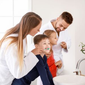 brushing teeth as family